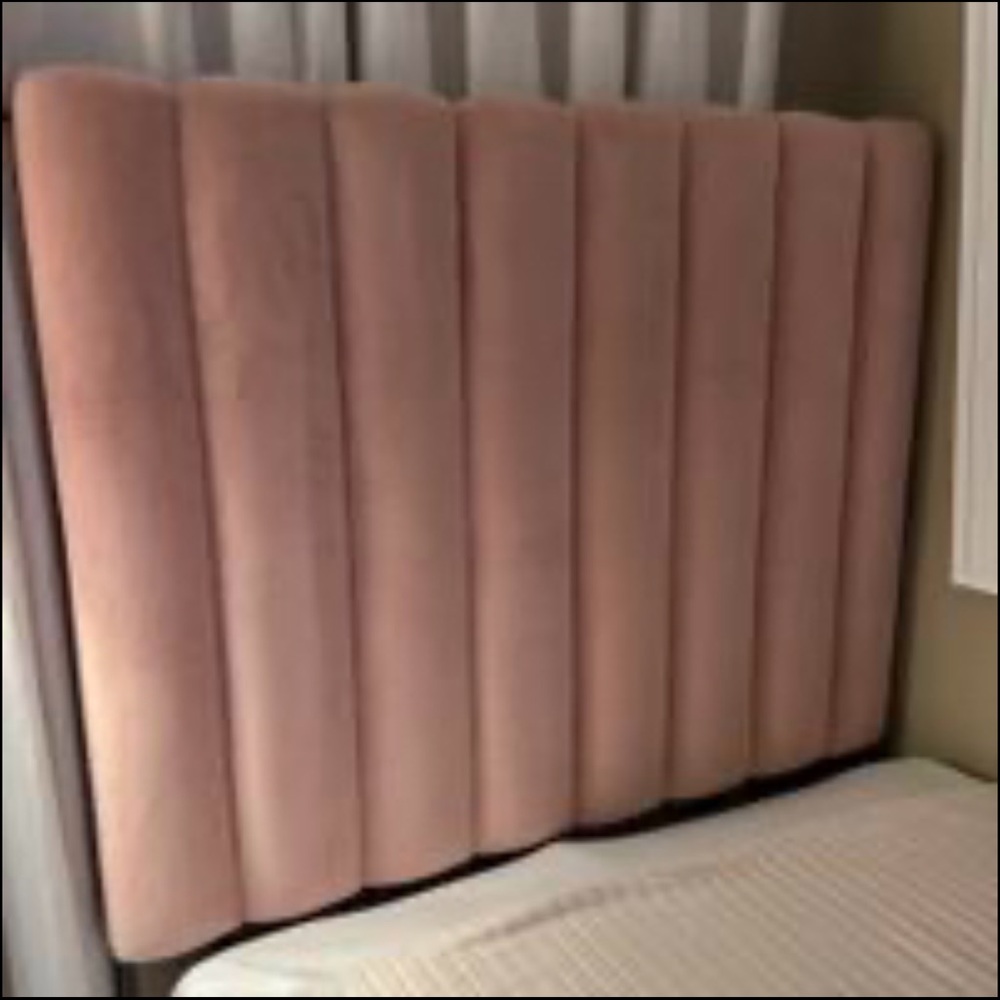 Two Light pink velvet twin size headboard with outlet on the side.